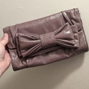 Purple faux leather clutch
